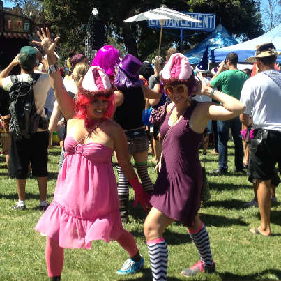 Two women wearing Vajayjay Hats